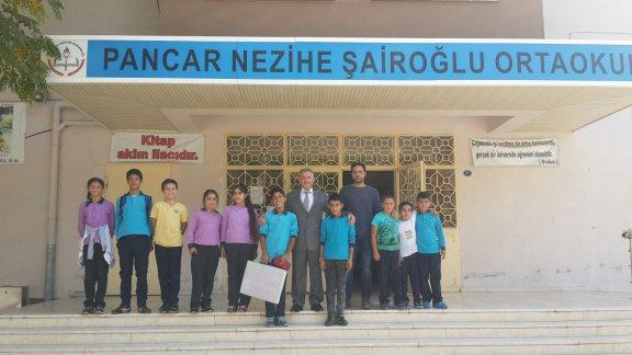 Torbalı İlçe Milli Eğitim Müdürü Cafer TOSUN  Pancar Nezihe Şairoğlu ortaokulunu ziyaret etti.
